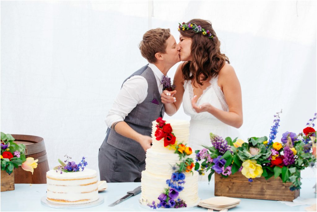 Brides eating wedding cake