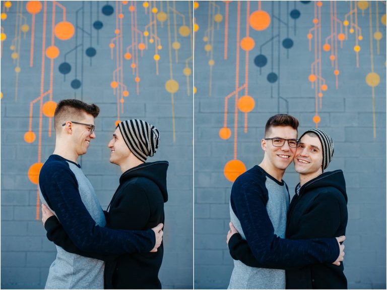 Two men smiling holding each other LGBT Denver photographers