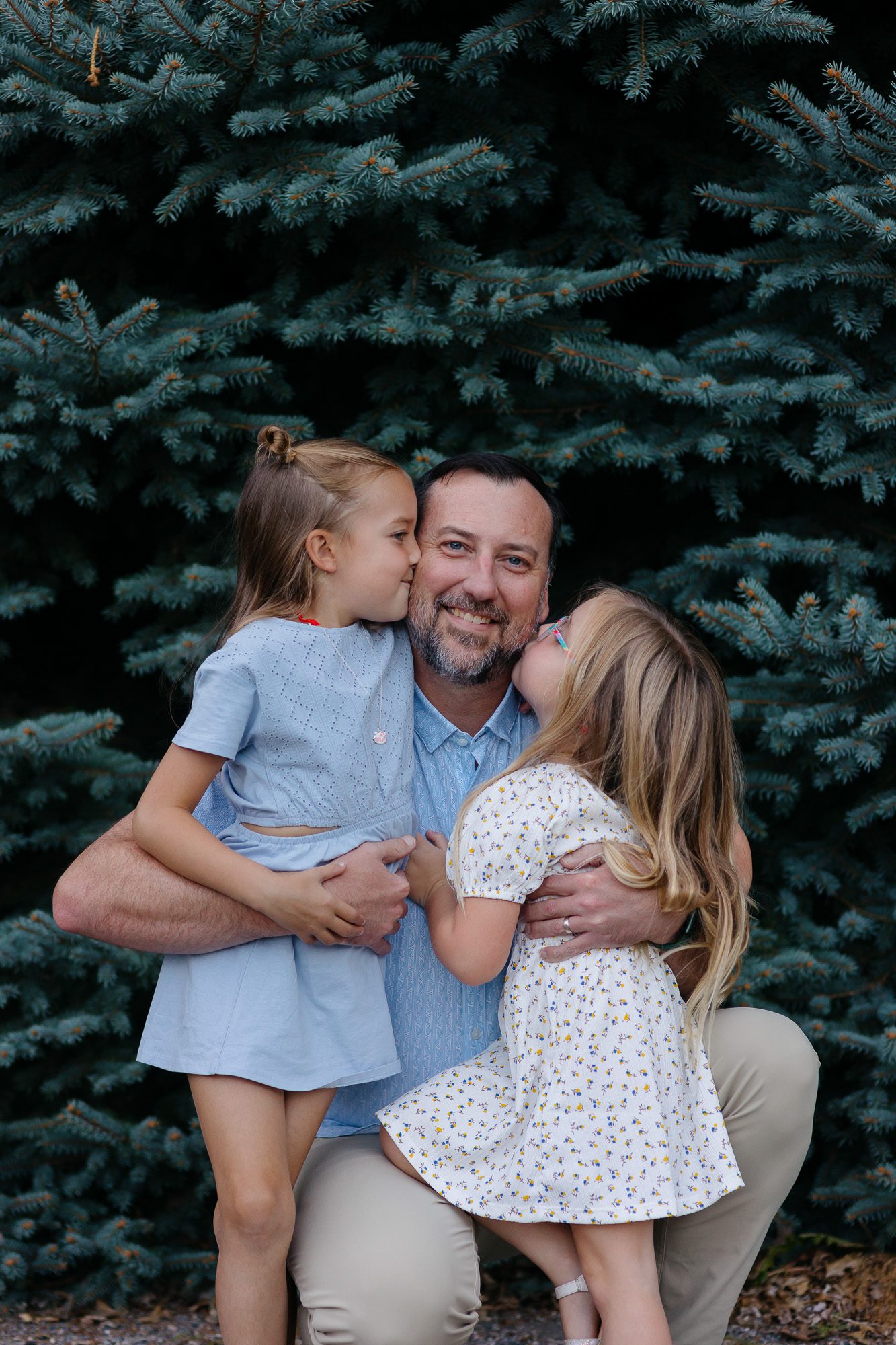 City Park Denver family photos with clients posing for family photo session