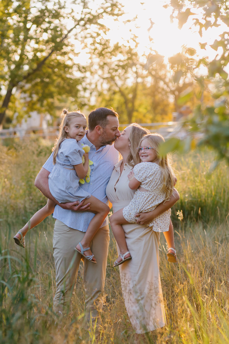 City Park Denver family photos with clients posing for family photo session 