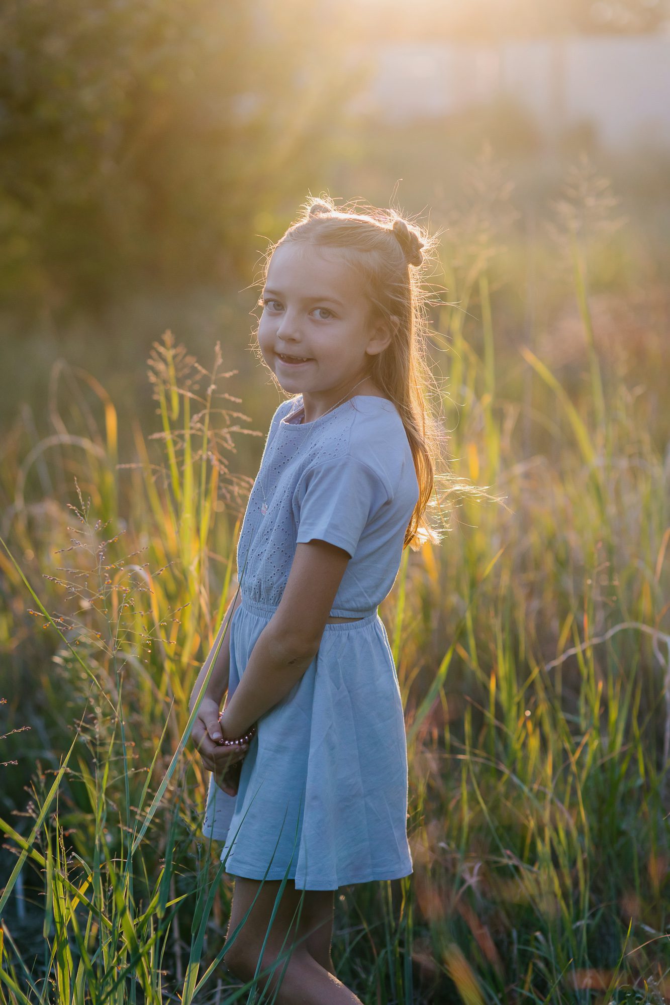 City Park Denver family photos with clients posing for family photo session