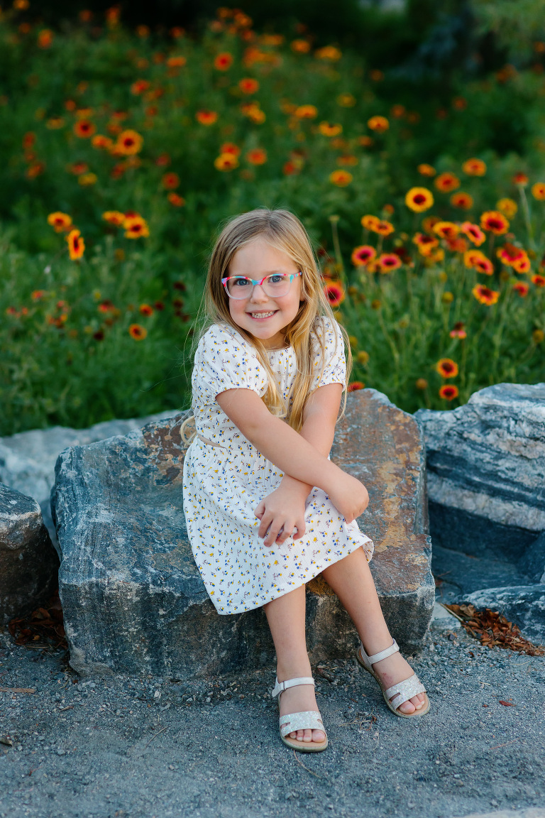 City Park Denver family photos with clients posing for family photo session 