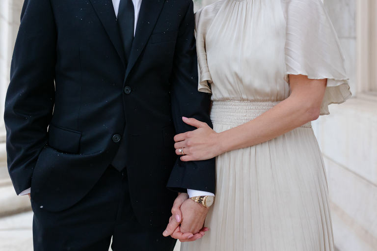 Closeup of Denver elopement couple holding hands