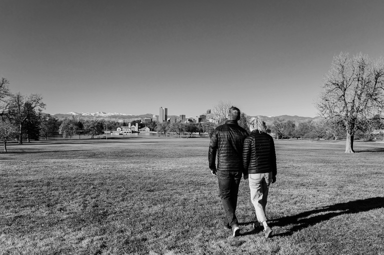 Black and white shot of couple walking off into the distance