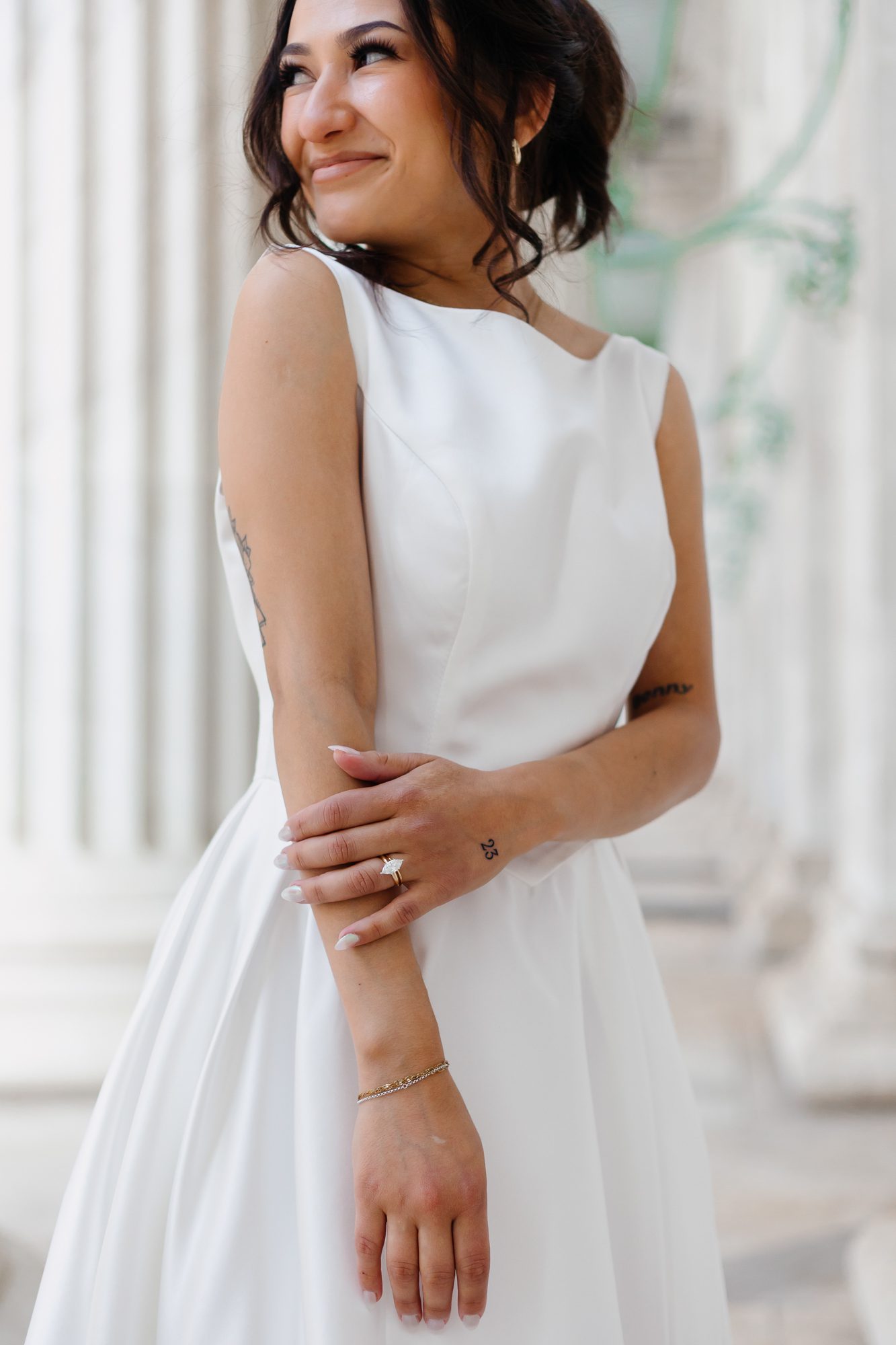 Close-up of matching hand tattoos commemorating their elopement