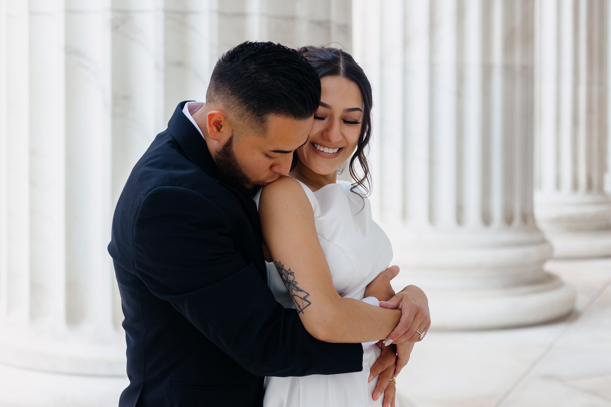 Bride and groom celebrating their courthouse elopement in Denver