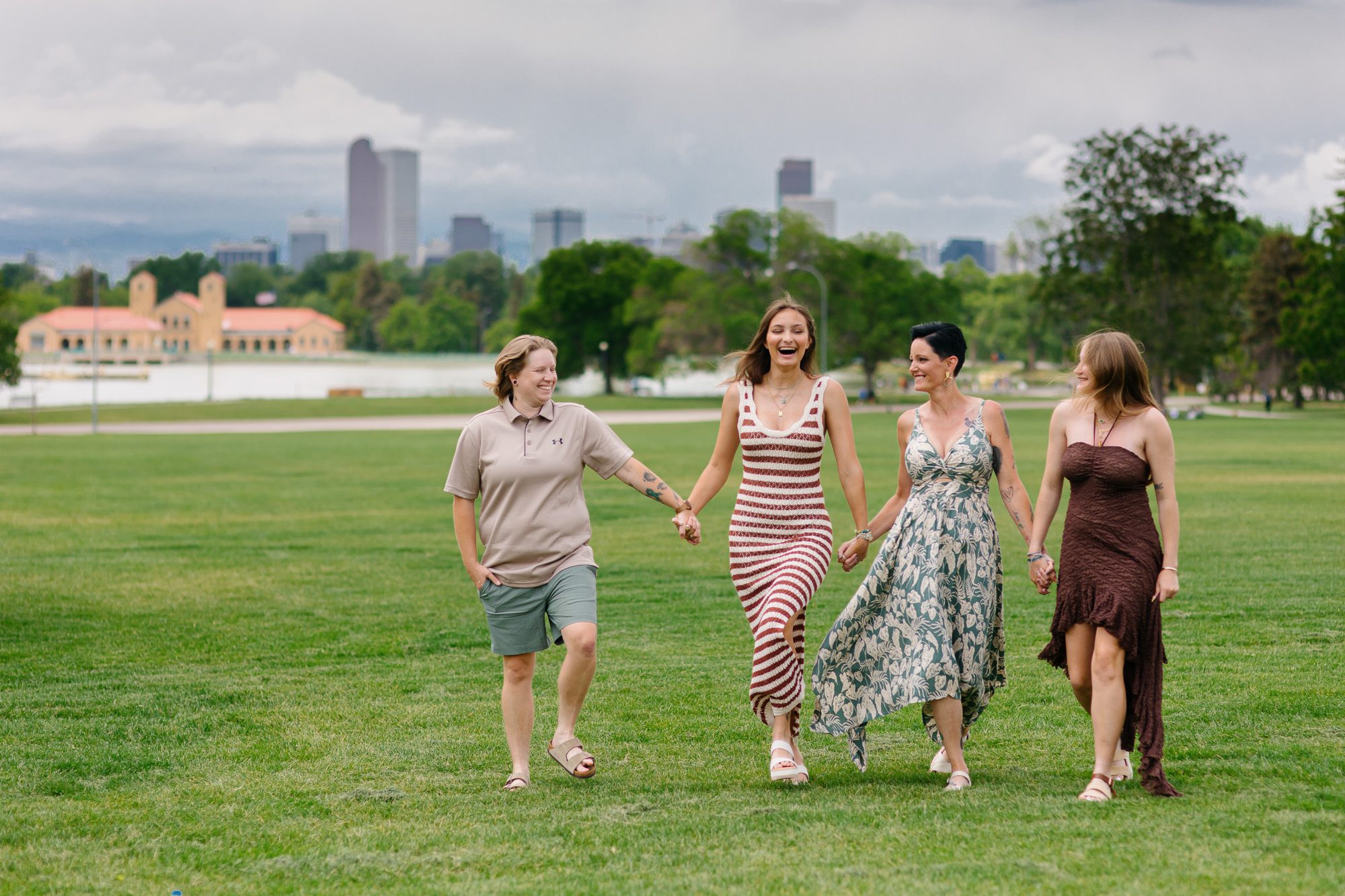 Parents and children smiling together during a Denver fall family photoshoot.