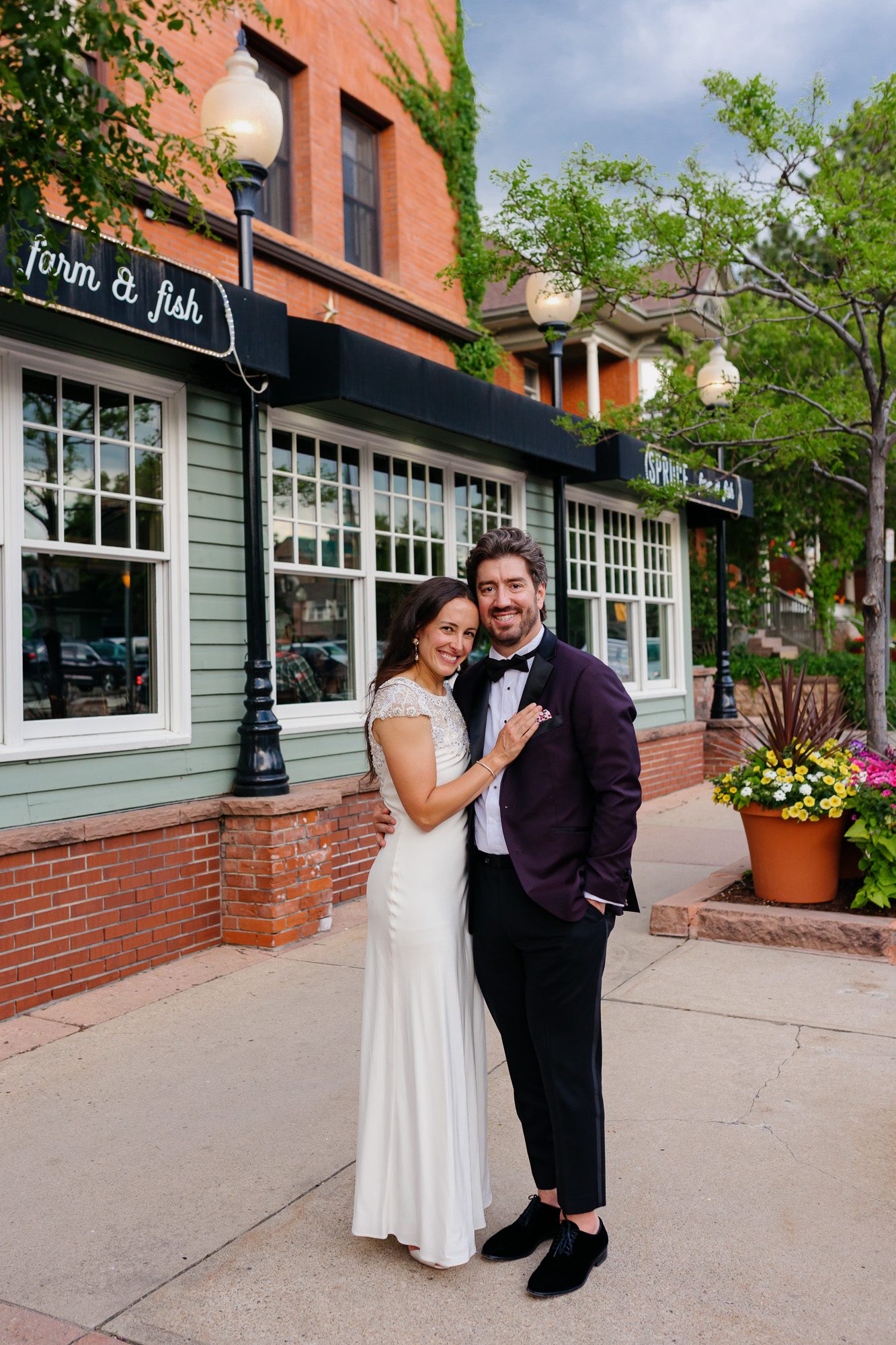 Couple posing for Boulder elopement photos during their anniversary session