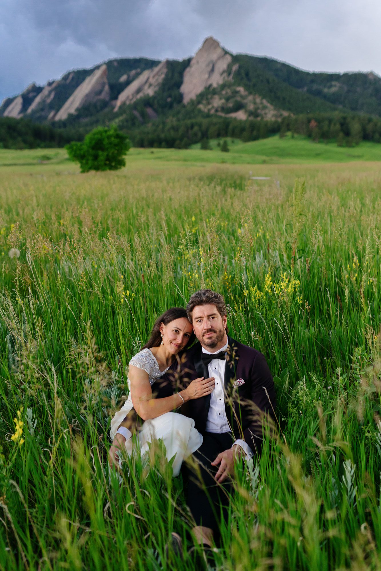 Couple posing for Boulder elopement photos during their anniversary session
