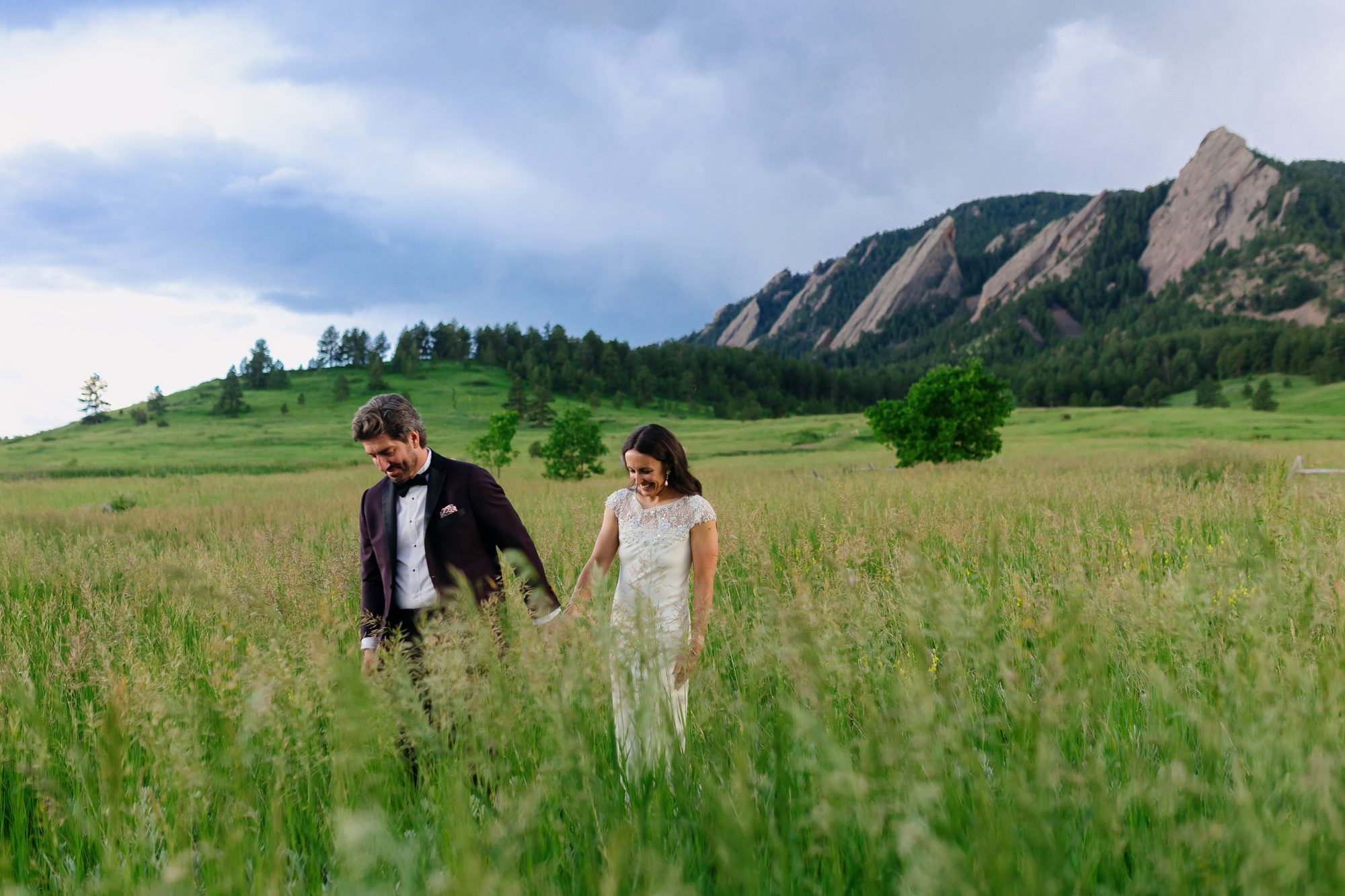 Couple posing for Boulder elopement photos during their anniversary session