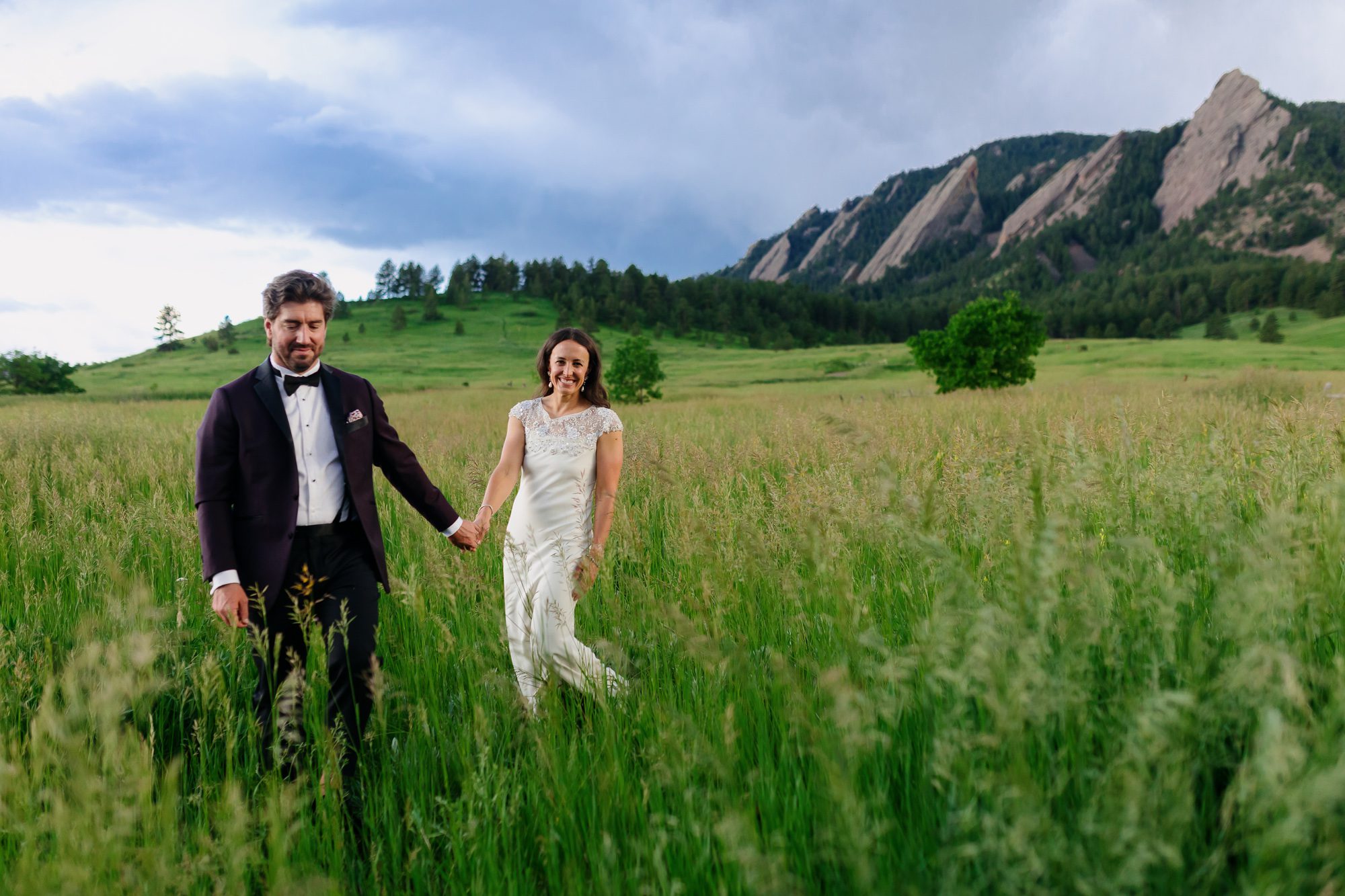 Couple posing for Boulder elopement photos during their anniversary session