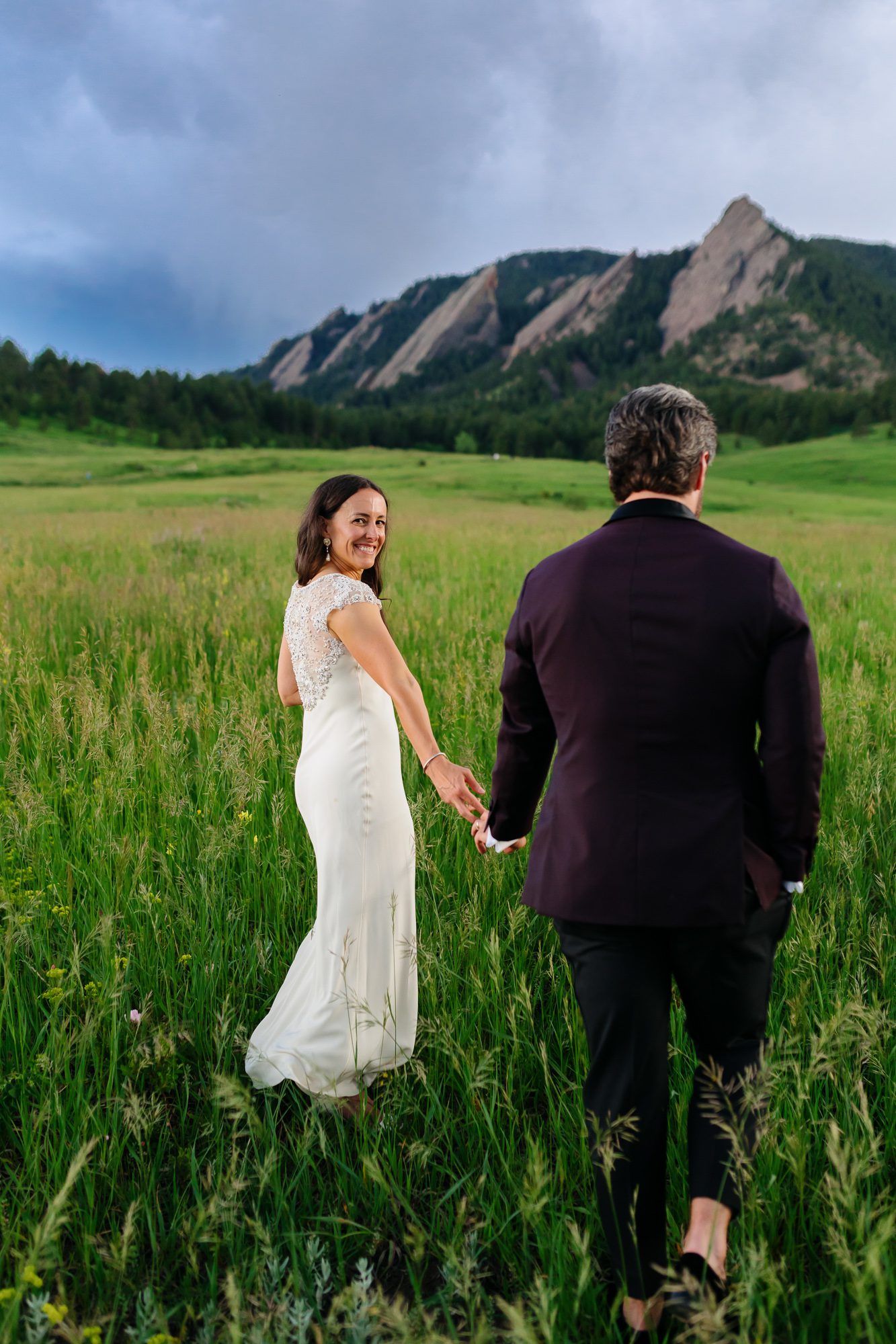 Couple posing for Boulder elopement photos during their anniversary session