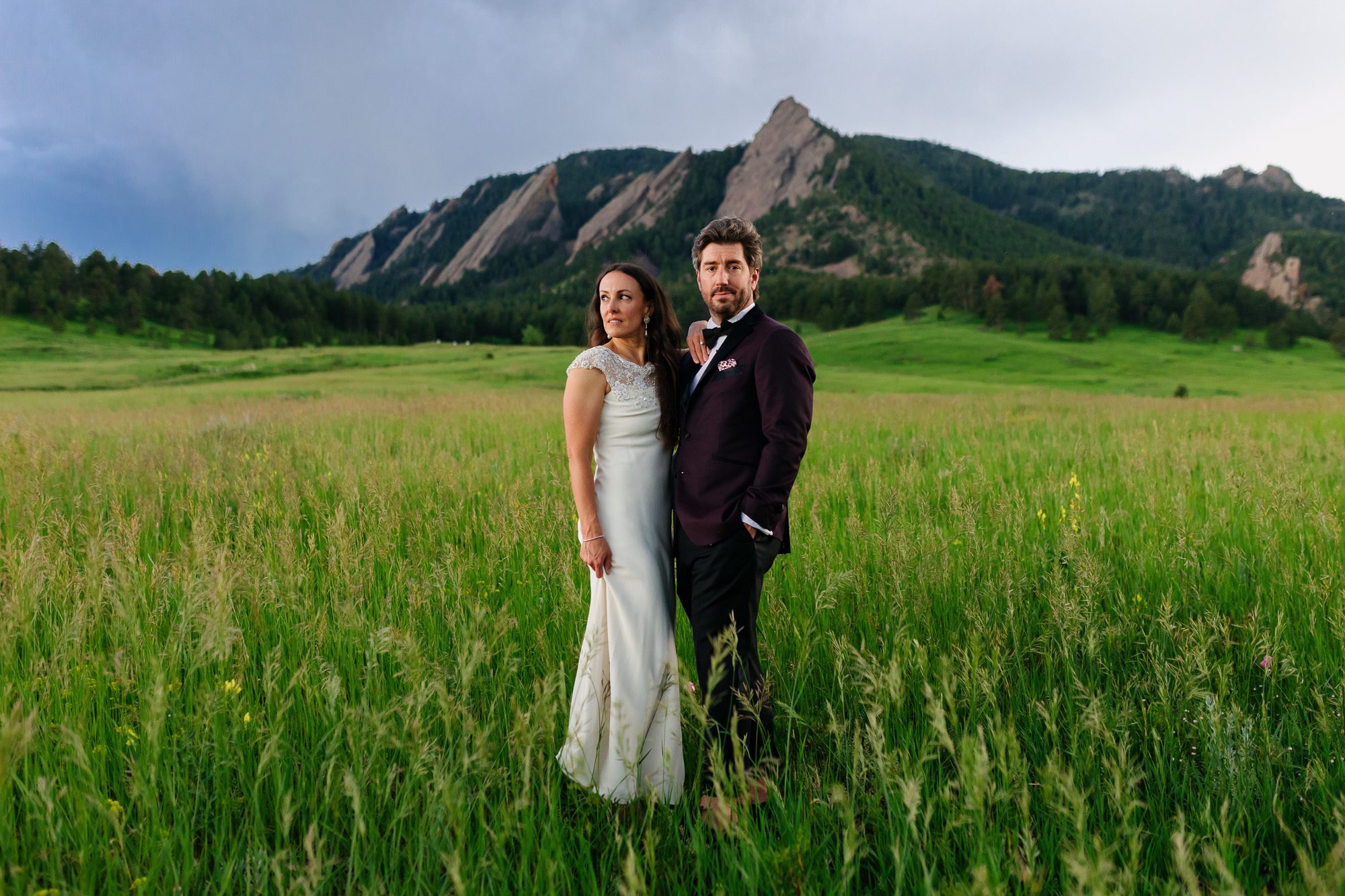 Couple posing for Boulder elopement photos during their anniversary session