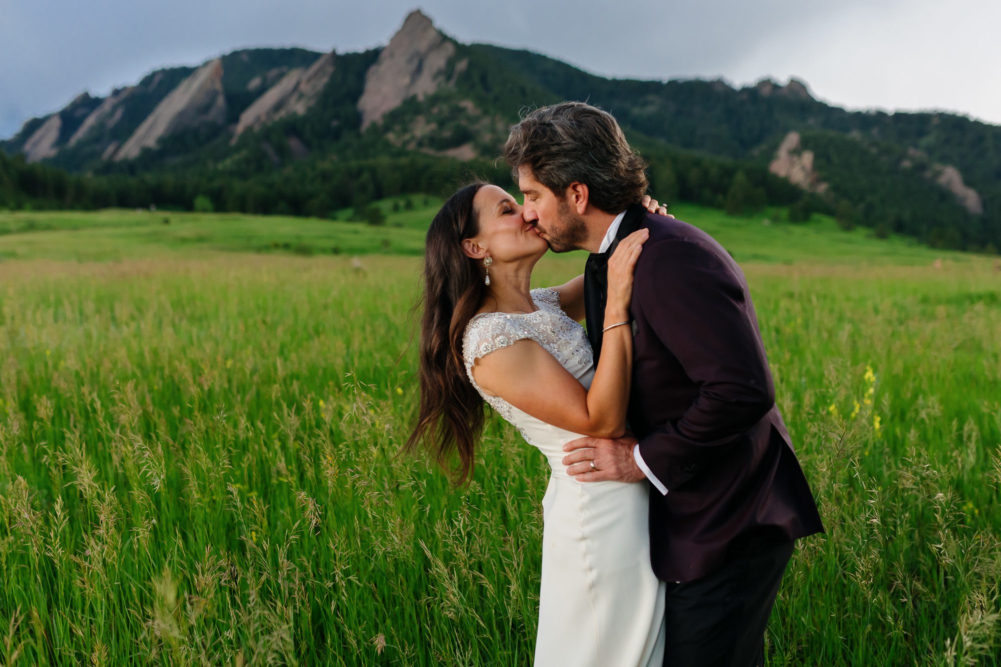 Couple posing for Boulder elopement photos during their anniversary session