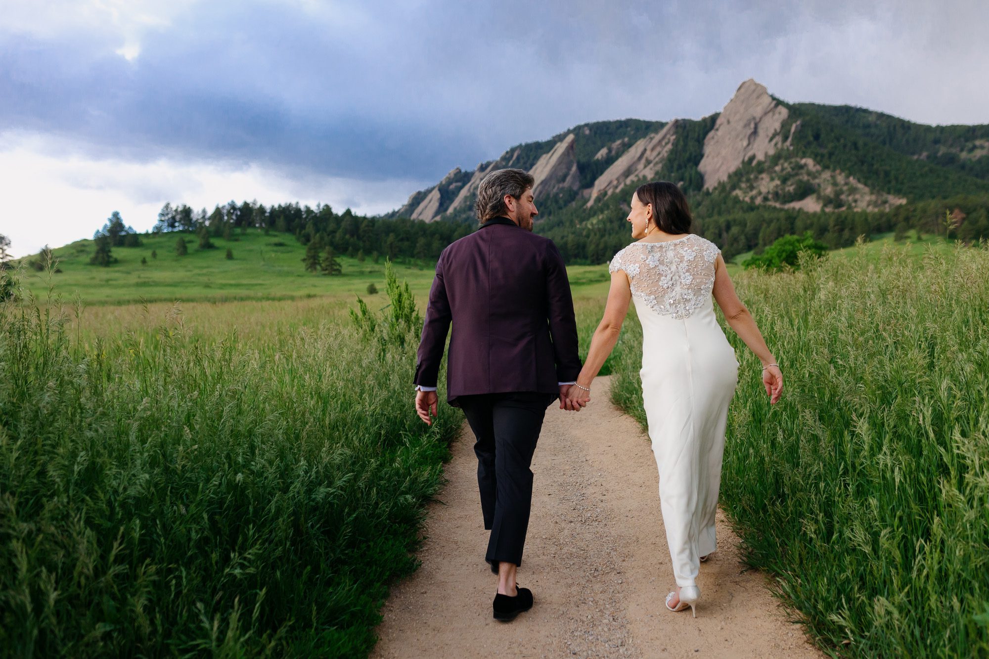 Couple posing for Boulder elopement photos during their anniversary session