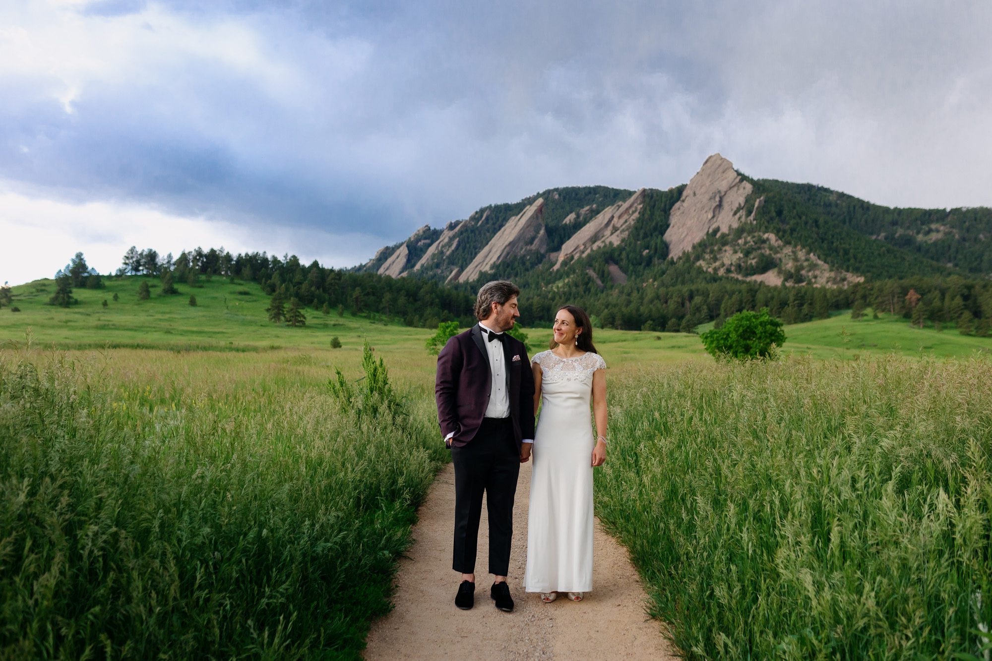 Couple posing for Boulder elopement photos during their anniversary session