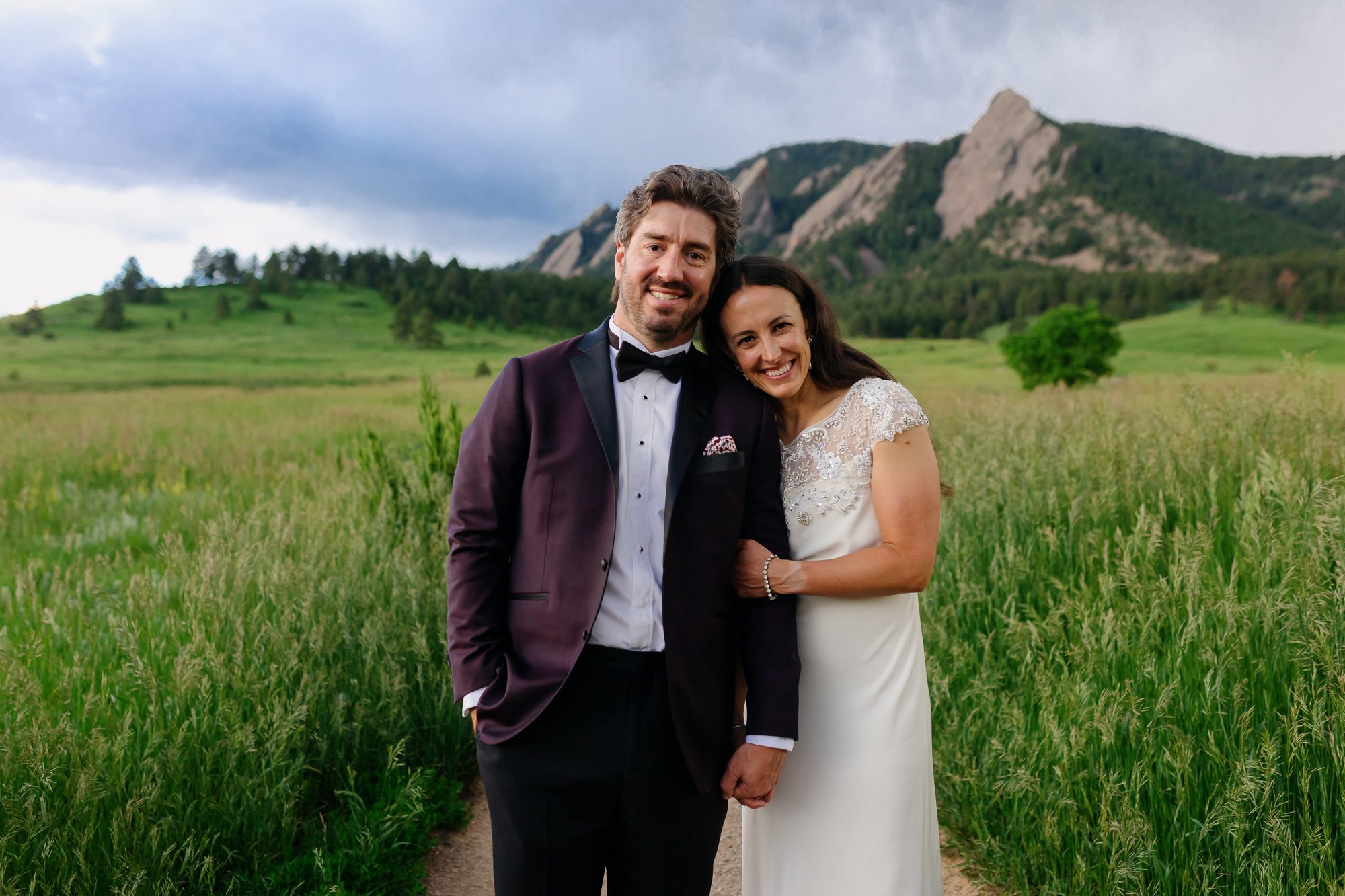 Couple posing for Boulder elopement photos during their anniversary session