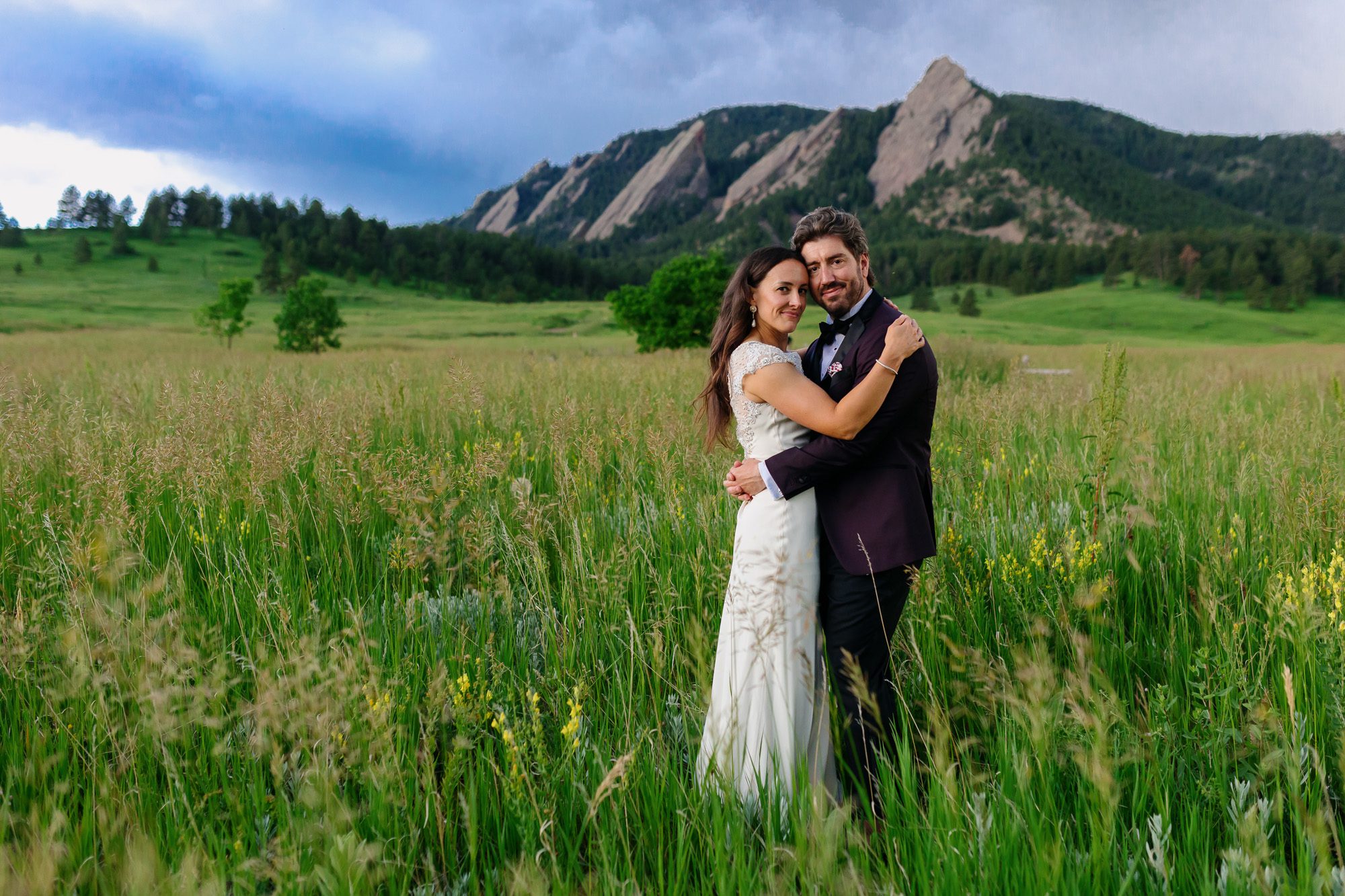 Couple posing for Boulder elopement photos during their anniversary session