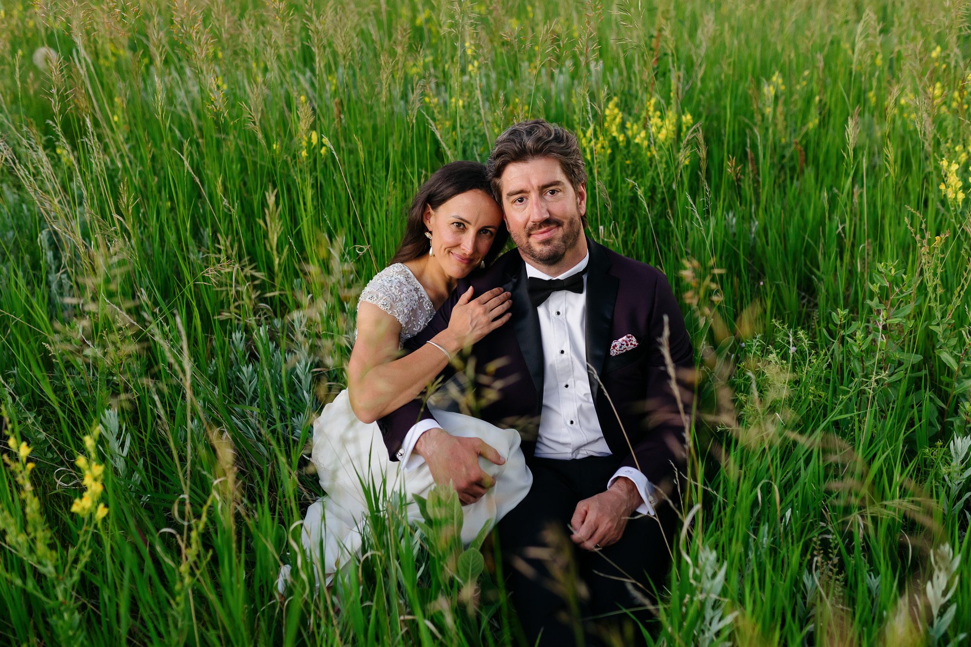 Couple posing for Boulder elopement photos during their anniversary session
