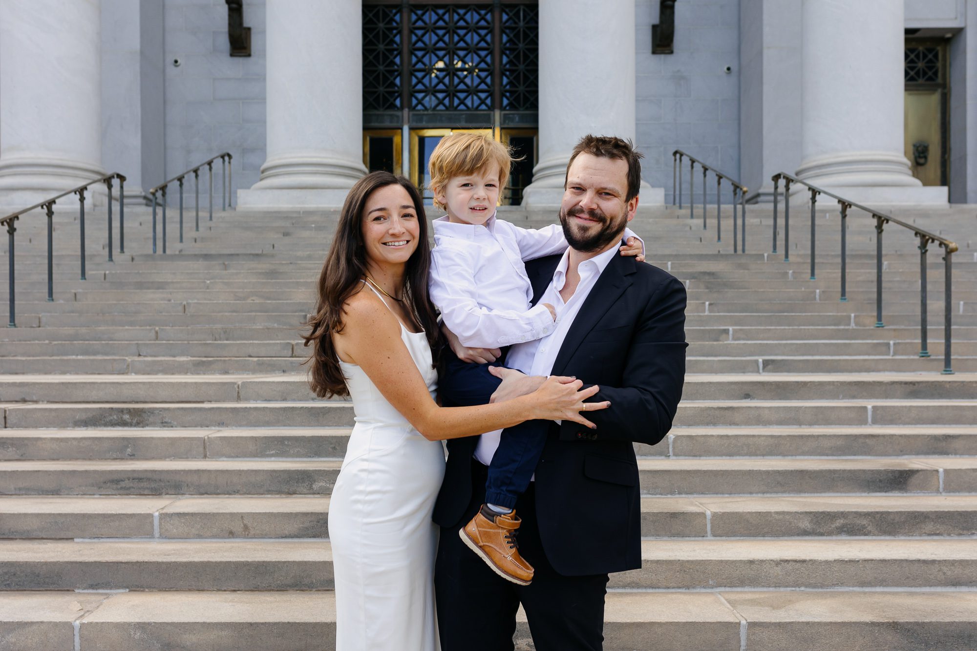 Denver courthouse elopement photographer captures couple on courthouse steps