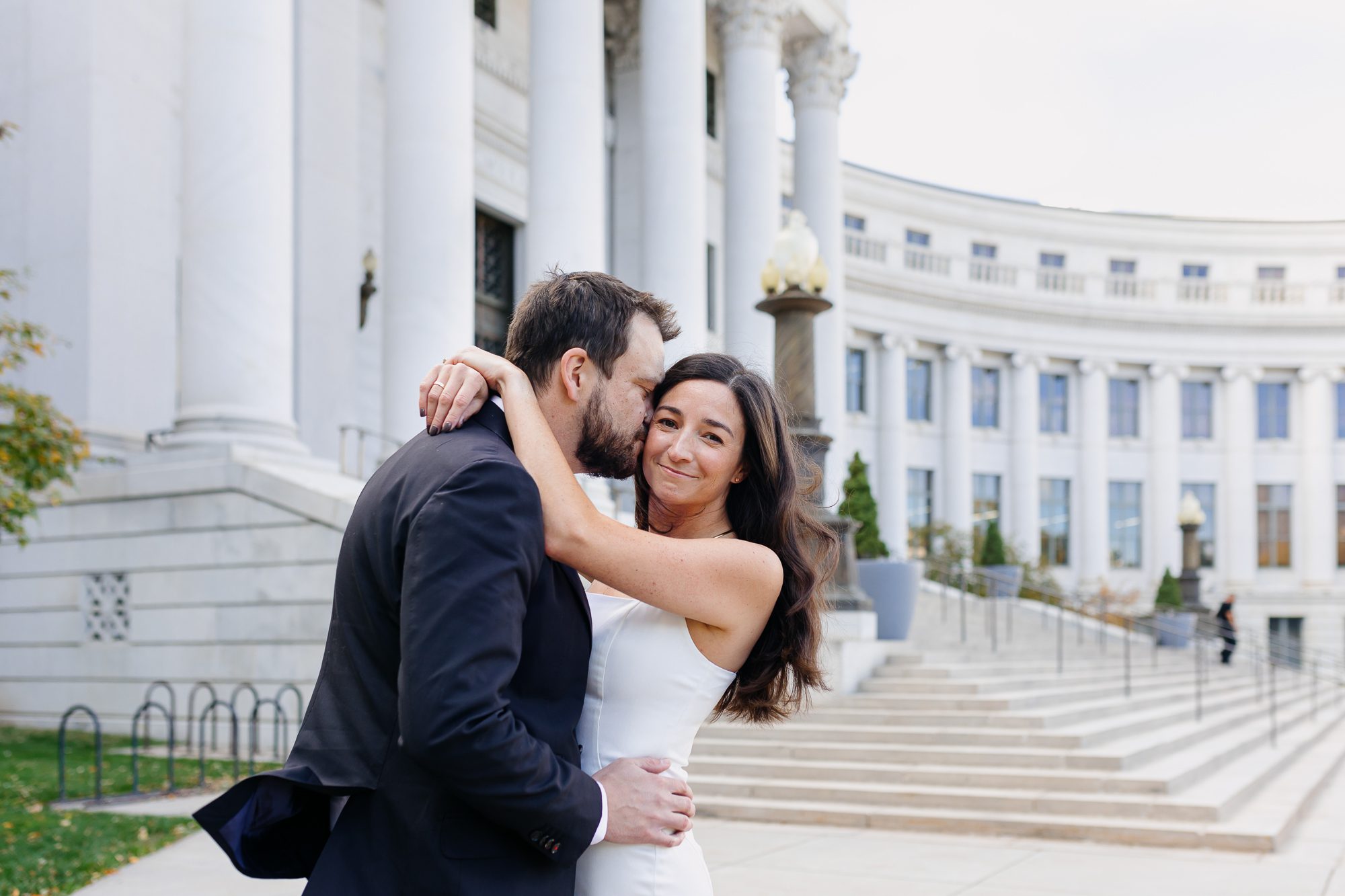 Denver courthouse elopement photographer captures bride and groom on courthouse steps