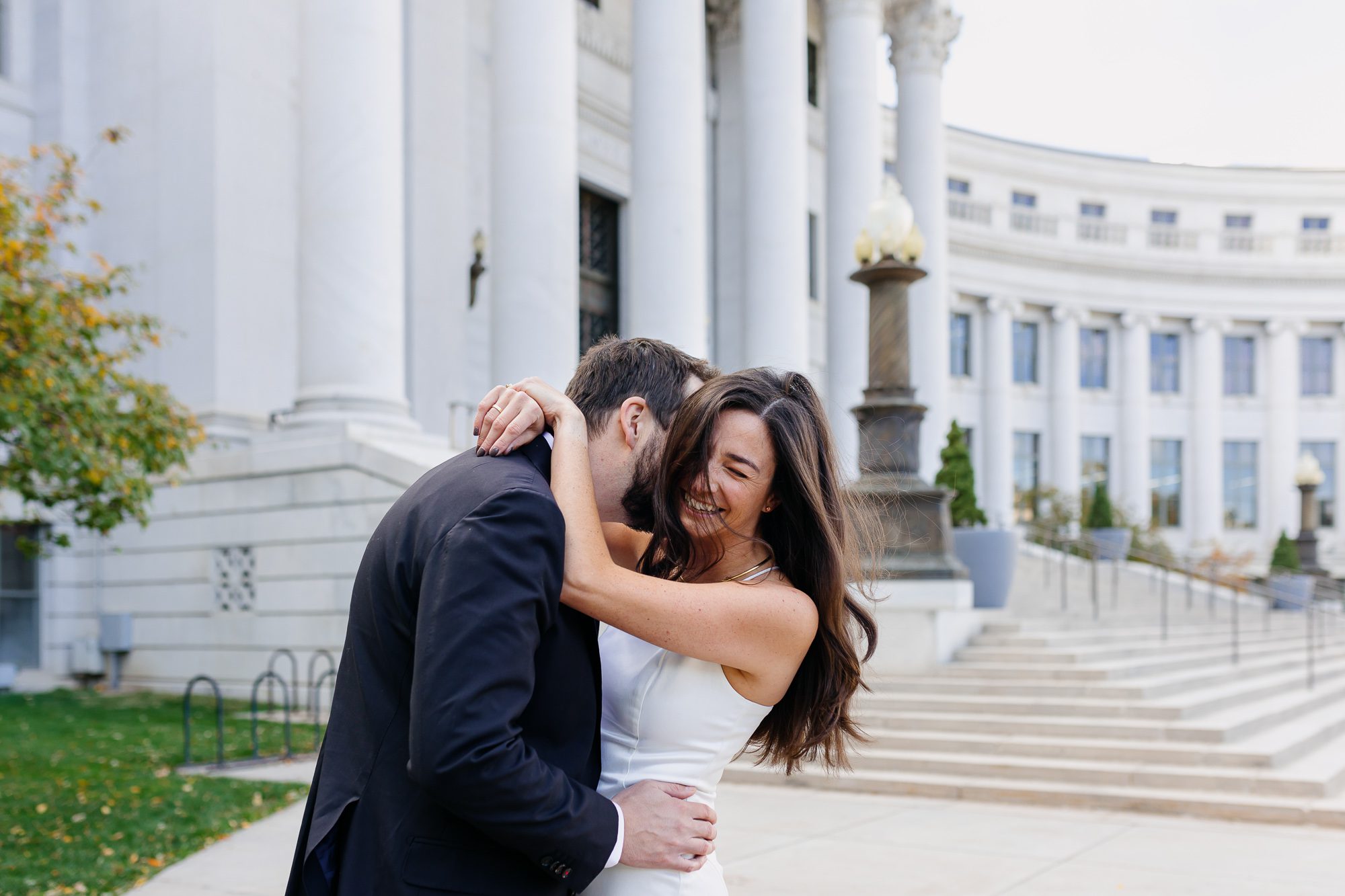 Denver courthouse elopement photographer captures bride and groom on courthouse steps