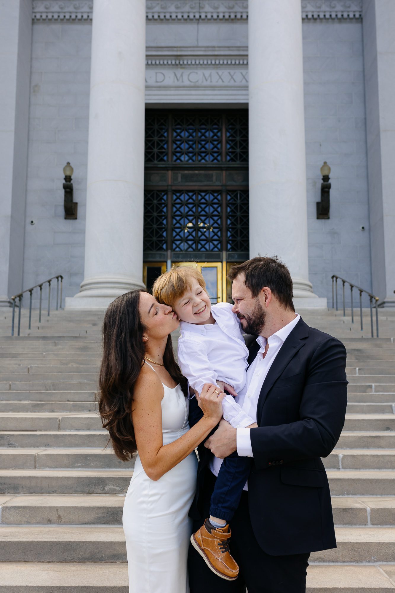 Denver courthouse elopement photographer captures couple on courthouse steps