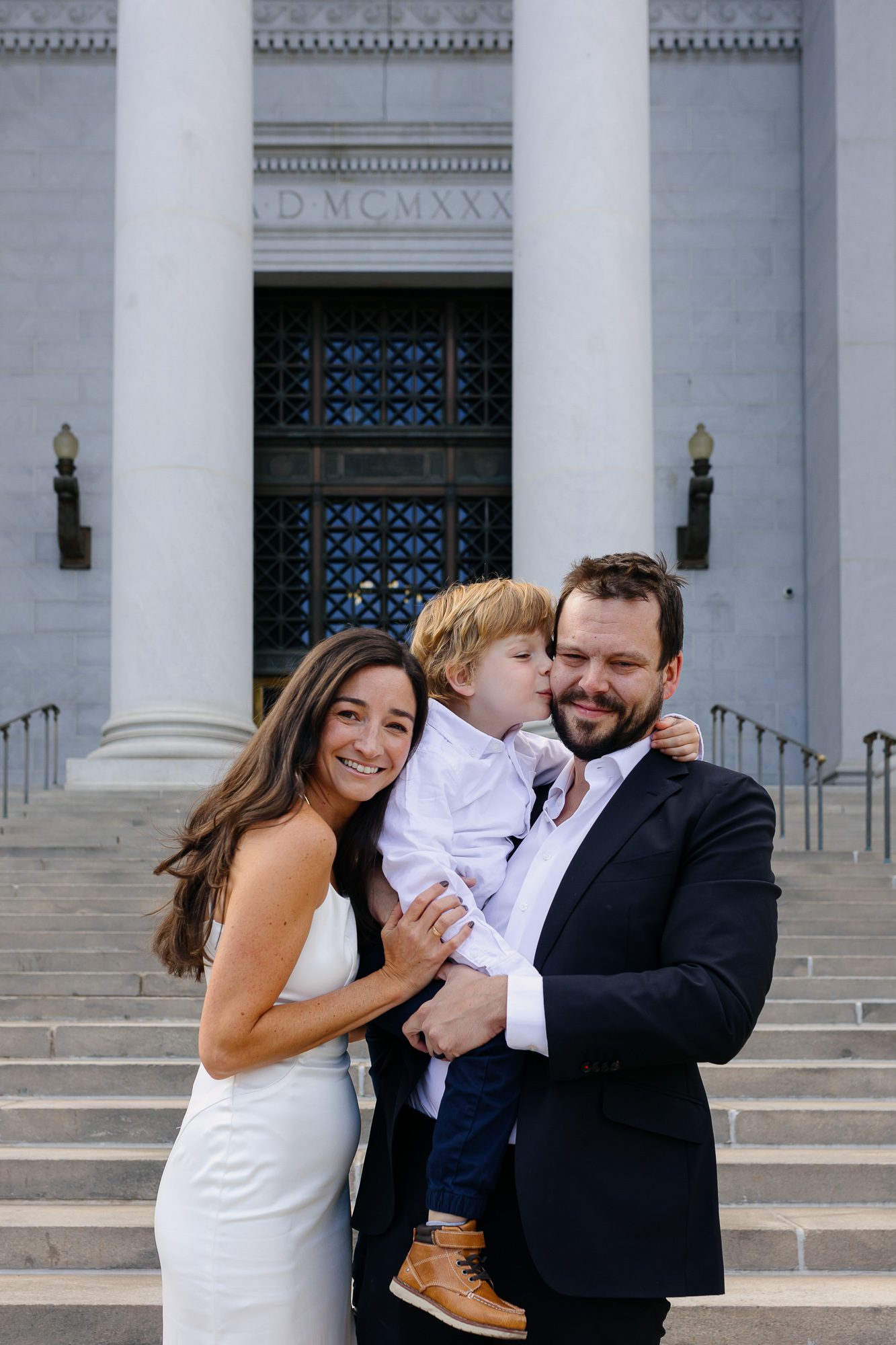 Denver courthouse elopement photographer captures couple on courthouse steps