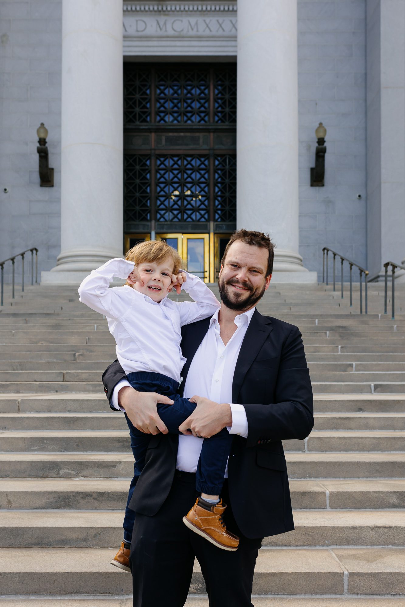 Denver courthouse elopement photographer captures couple on courthouse steps
