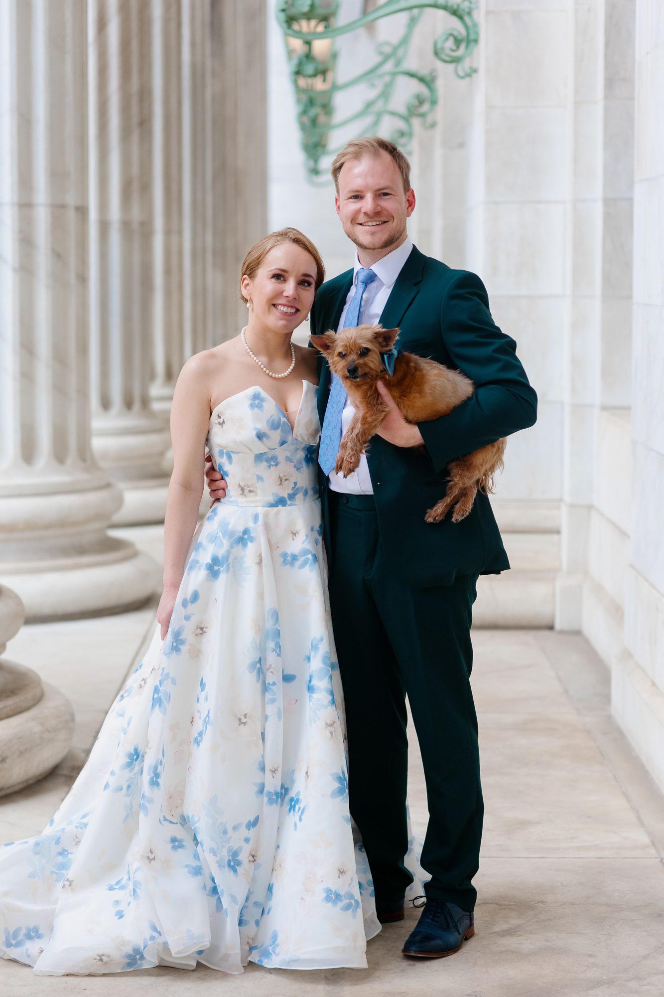 Clients posing for Denver courthouse elopement photos
