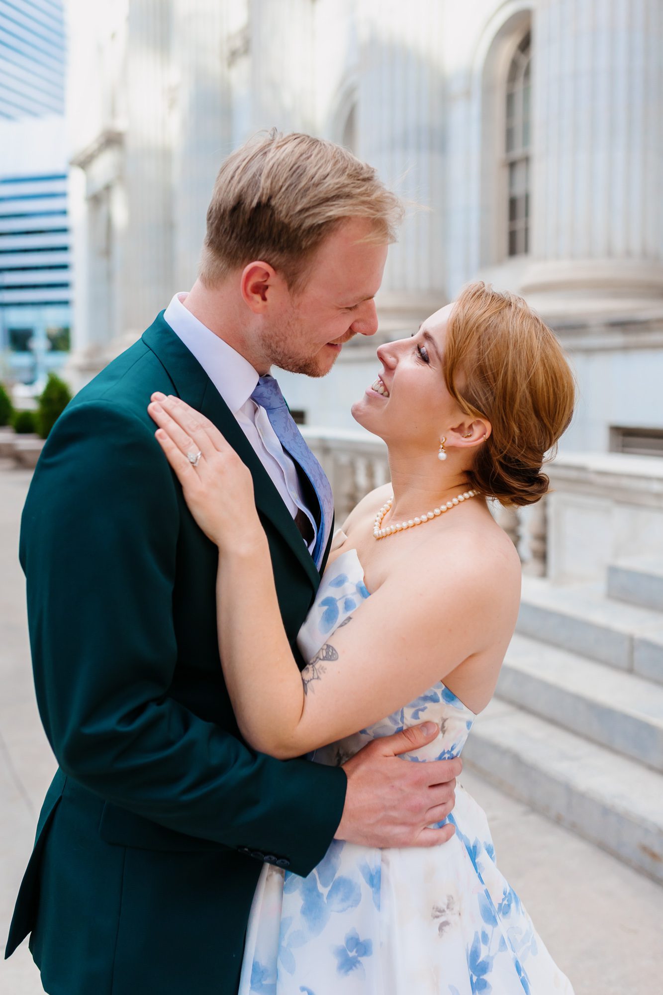 Clients posing for Denver courthouse elopement photos