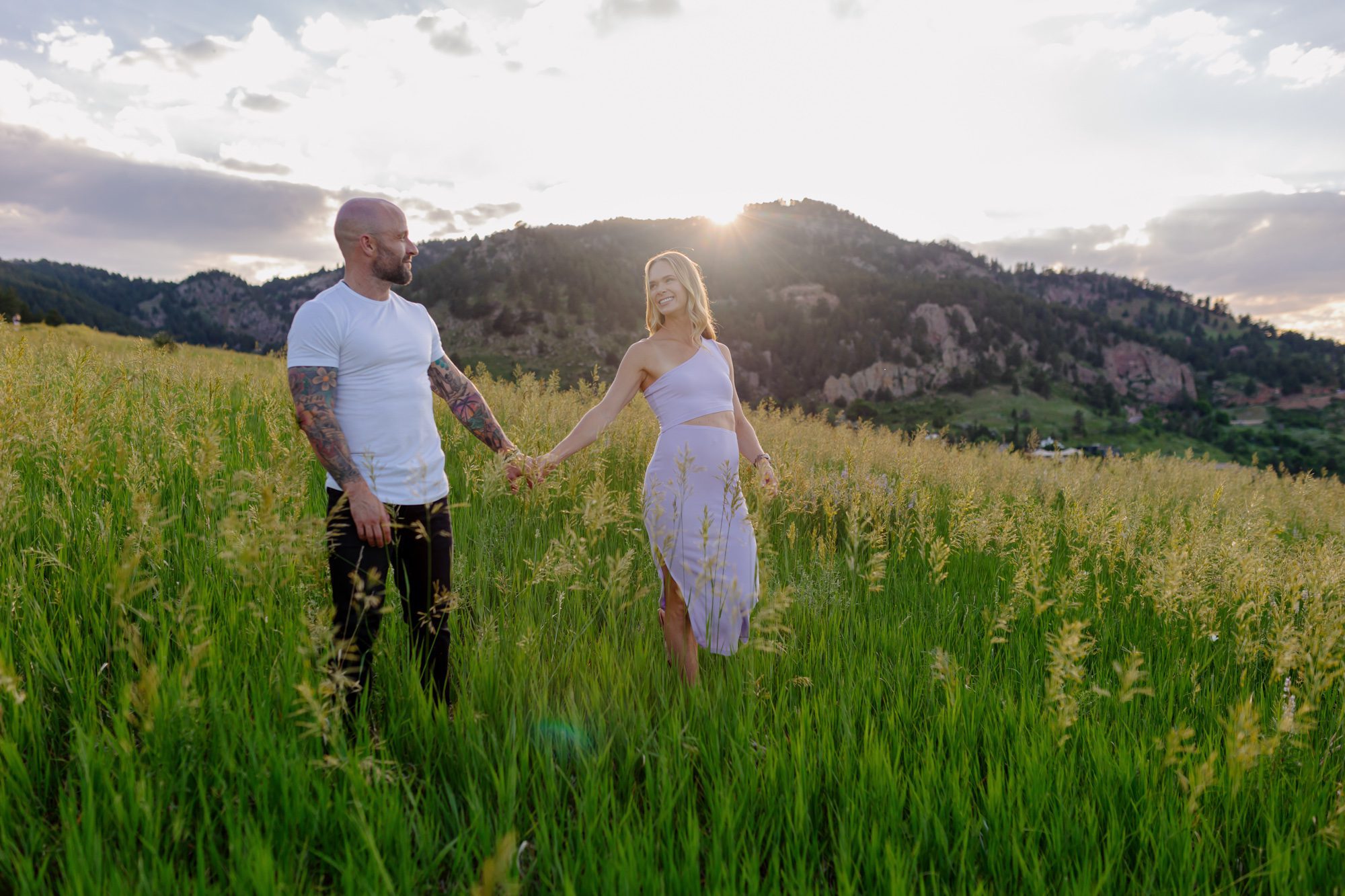 Couple posing for photos at Chautauqua Park in Boulder
