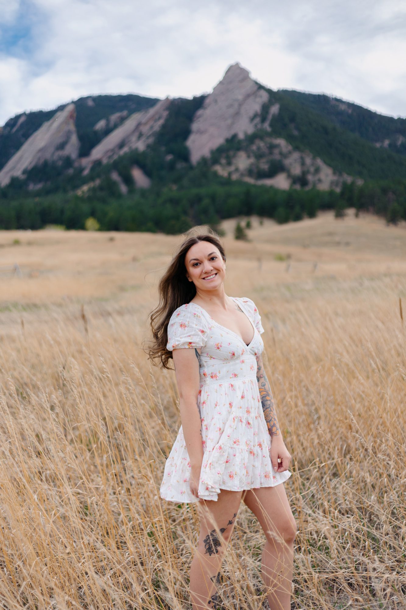 Recent college grad posing for Boulder graduation session