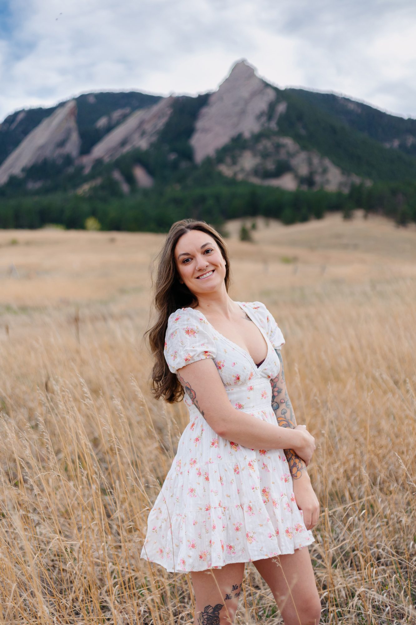 Recent college grad posing for Boulder graduation session