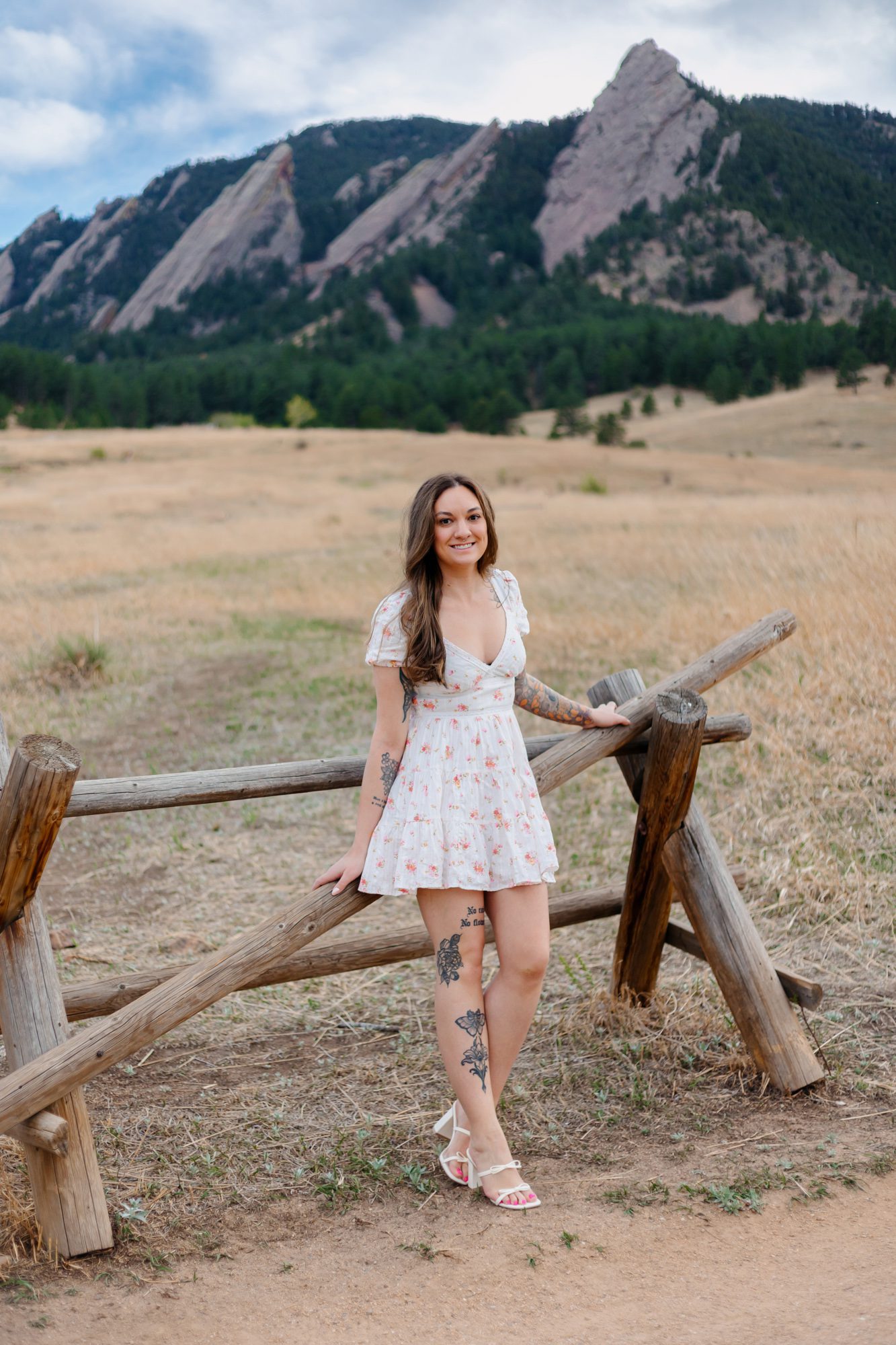 Recent college grad posing for Boulder graduation session