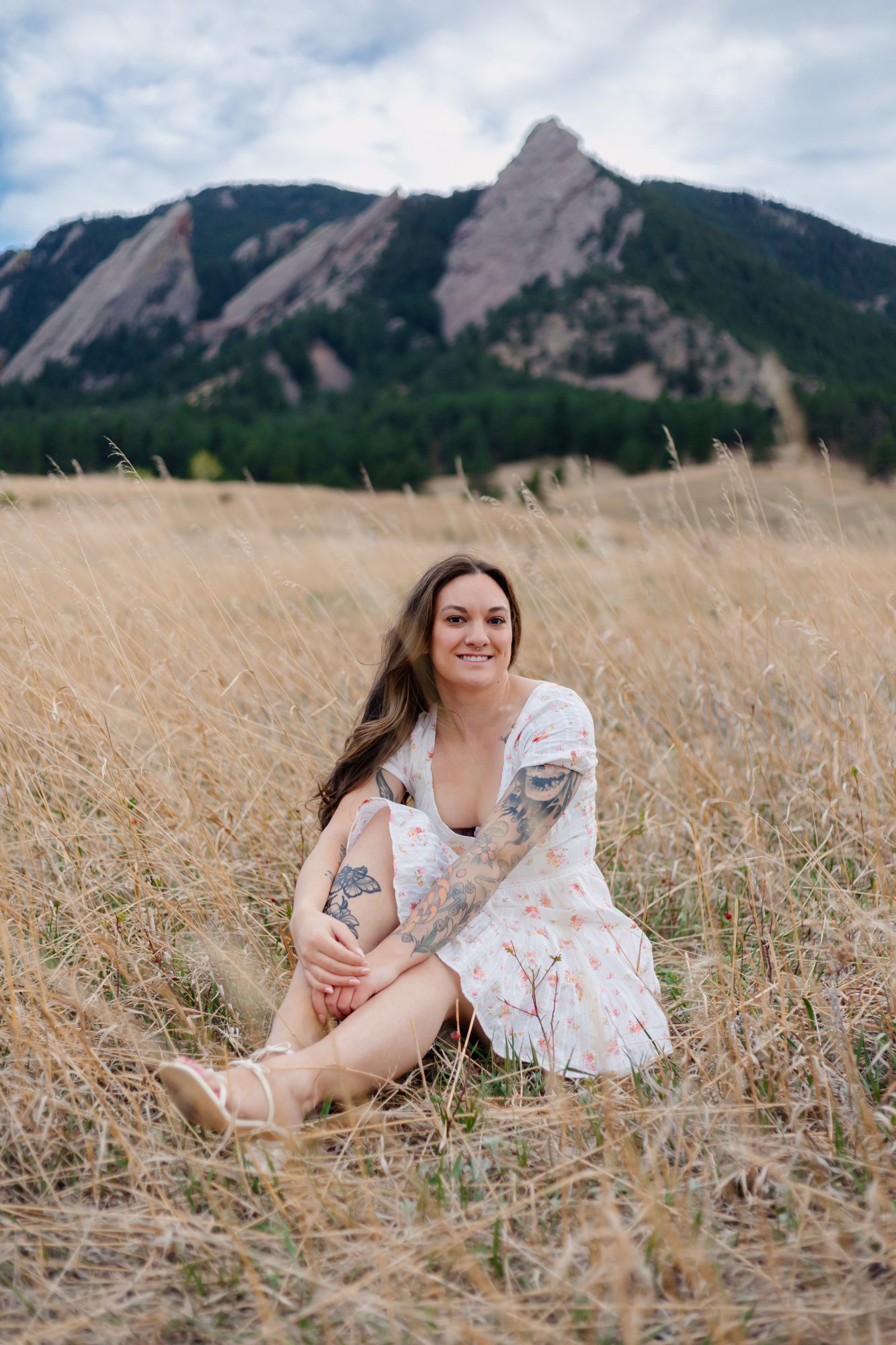 Recent college grad posing for Boulder graduation session
