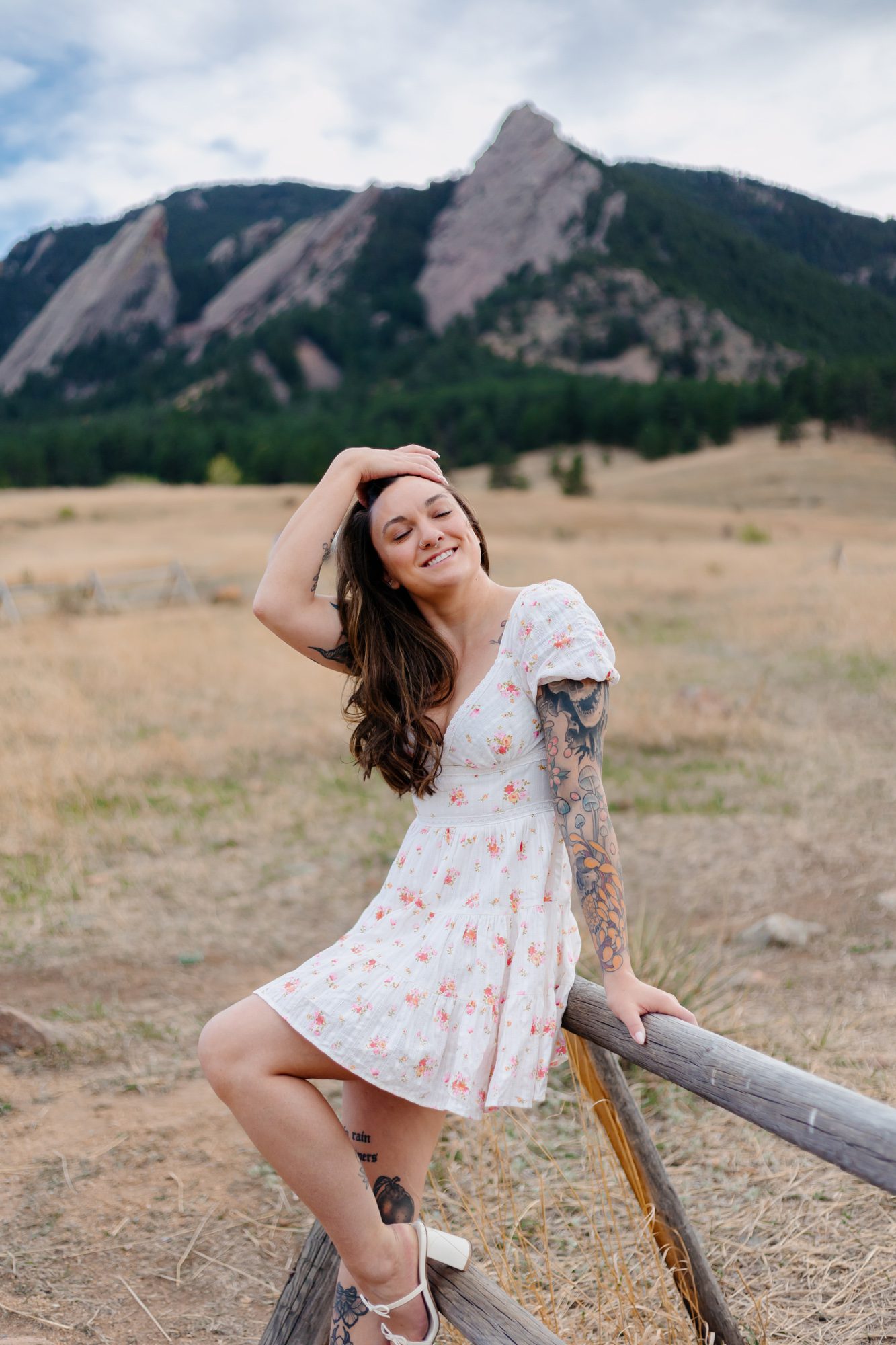 Recent Front Range Community College grad posing for Boulder graduation session