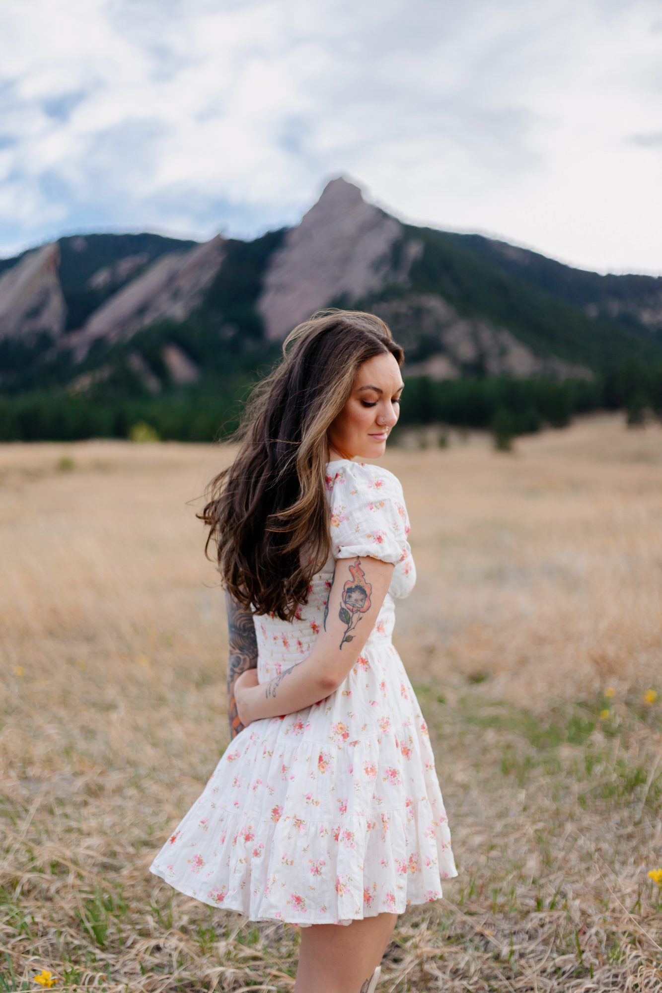 Recent Front Range Community College grad posing for Boulder graduation session